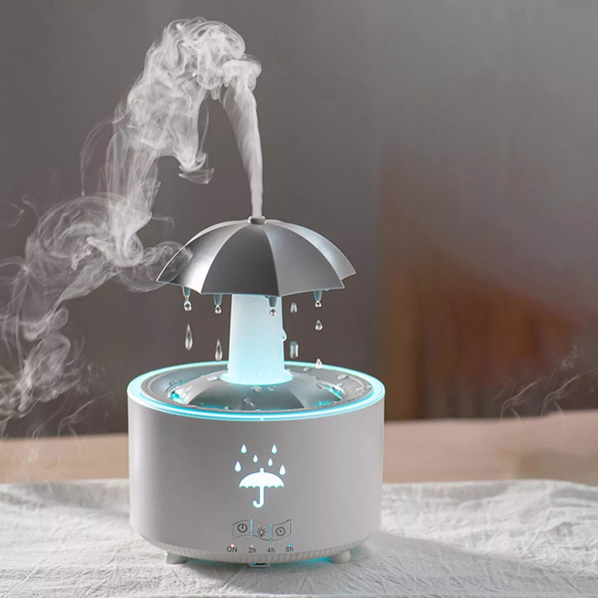 Humidificador giratorio con gotas de lluvia